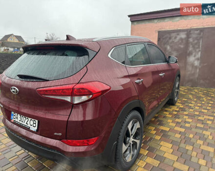 Красный Хендай Туксон, объемом двигателя 2 л и пробегом 110 тыс. км за 17000 $, фото 7 на Automoto.ua