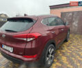 Красный Хендай Туксон, объемом двигателя 2 л и пробегом 110 тыс. км за 17000 $, фото 7 на Automoto.ua