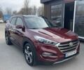 Красный Хендай Туксон, объемом двигателя 1.6 л и пробегом 86 тыс. км за 15800 $, фото 1 на Automoto.ua