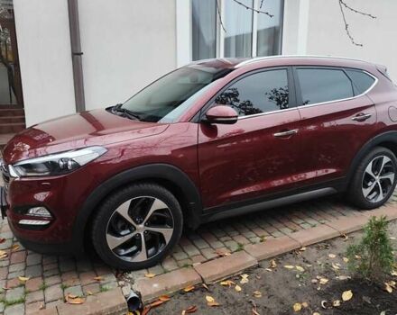 Красный Хендай Туксон, объемом двигателя 2.02 л и пробегом 110 тыс. км за 19800 $, фото 6 на Automoto.ua