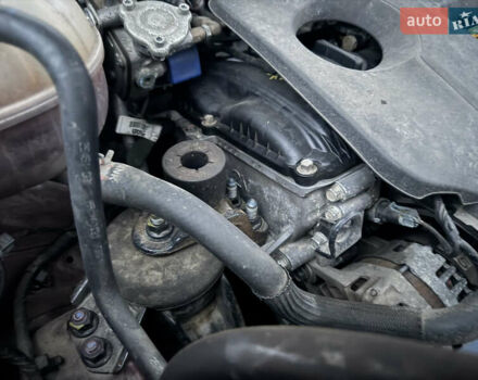 Красный Хендай Туксон, объемом двигателя 2 л и пробегом 110 тыс. км за 17000 $, фото 12 на Automoto.ua