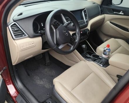 Червоний Хендай Туксон, об'ємом двигуна 2 л та пробігом 110 тис. км за 19800 $, фото 7 на Automoto.ua