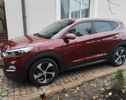 Червоний Хендай Туксон, об'ємом двигуна 2 л та пробігом 110 тис. км за 19800 $, фото 6 на Automoto.ua