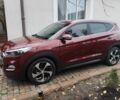 Червоний Хендай Туксон, об'ємом двигуна 2 л та пробігом 110 тис. км за 19800 $, фото 6 на Automoto.ua