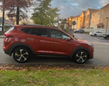 Червоний Хендай Туксон, об'ємом двигуна 1.6 л та пробігом 72 тис. км за 15500 $, фото 7 на Automoto.ua