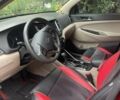 Красный Хендай Туксон, объемом двигателя 2 л и пробегом 93 тыс. км за 15800 $, фото 8 на Automoto.ua