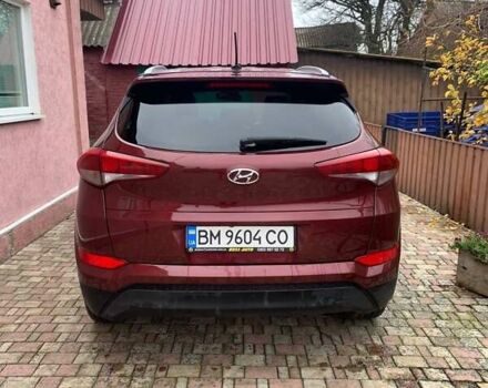 Красный Хендай Туксон, объемом двигателя 2 л и пробегом 123 тыс. км за 15300 $, фото 8 на Automoto.ua