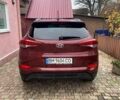 Красный Хендай Туксон, объемом двигателя 2 л и пробегом 123 тыс. км за 15300 $, фото 8 на Automoto.ua