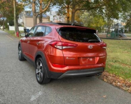 Червоний Хендай Туксон, об'ємом двигуна 1.6 л та пробігом 72 тис. км за 15500 $, фото 4 на Automoto.ua