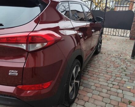 Червоний Хендай Туксон, об'ємом двигуна 2 л та пробігом 110 тис. км за 19800 $, фото 3 на Automoto.ua