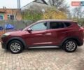 Красный Хендай Туксон, объемом двигателя 2 л и пробегом 123 тыс. км за 15300 $, фото 6 на Automoto.ua