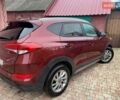 Красный Хендай Туксон, объемом двигателя 2 л и пробегом 123 тыс. км за 15300 $, фото 4 на Automoto.ua