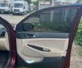 Красный Хендай Туксон, объемом двигателя 2 л и пробегом 101 тыс. км за 15700 $, фото 15 на Automoto.ua