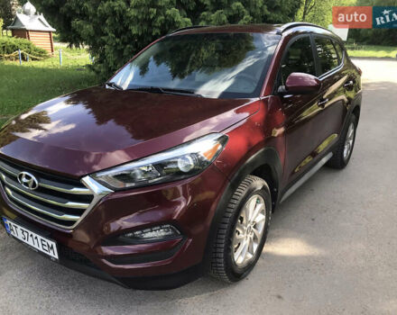 Червоний Хендай Туксон, об'ємом двигуна 2 л та пробігом 56 тис. км за 15500 $, фото 4 на Automoto.ua