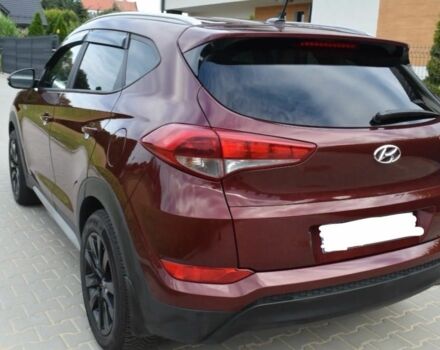 Червоний Хендай Туксон, об'ємом двигуна 2 л та пробігом 117 тис. км за 10300 $, фото 5 на Automoto.ua