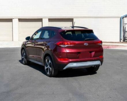 Червоний Хендай Туксон, об'ємом двигуна 1.6 л та пробігом 54 тис. км за 10300 $, фото 5 на Automoto.ua