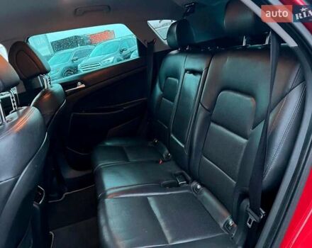 Червоний Хендай Туксон, об'ємом двигуна 2 л та пробігом 136 тис. км за 18690 $, фото 36 на Automoto.ua