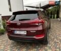 Красный Хендай Туксон, объемом двигателя 2 л и пробегом 160 тыс. км за 17500 $, фото 1 на Automoto.ua
