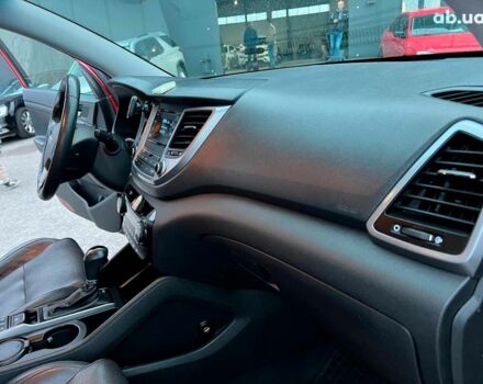 Червоний Хендай Туксон, об'ємом двигуна 2 л та пробігом 136 тис. км за 18690 $, фото 39 на Automoto.ua