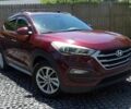 Красный Хендай Туксон, объемом двигателя 2 л и пробегом 72 тыс. км за 5500 $, фото 1 на Automoto.ua