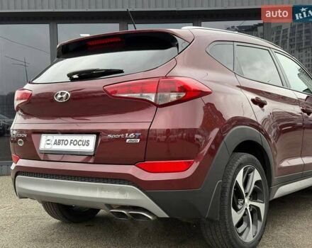 Червоний Хендай Туксон, об'ємом двигуна 1.59 л та пробігом 117 тис. км за 15890 $, фото 7 на Automoto.ua