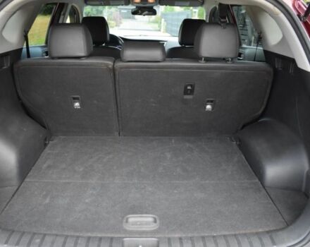 Червоний Хендай Туксон, об'ємом двигуна 2 л та пробігом 117 тис. км за 10300 $, фото 8 на Automoto.ua