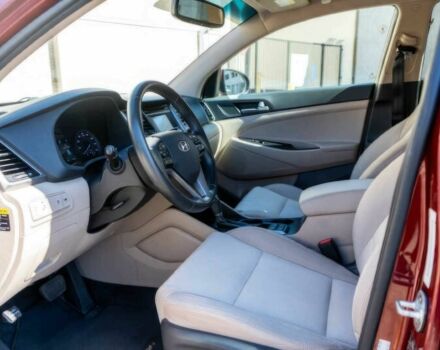 Червоний Хендай Туксон, об'ємом двигуна 1.6 л та пробігом 54 тис. км за 10300 $, фото 8 на Automoto.ua