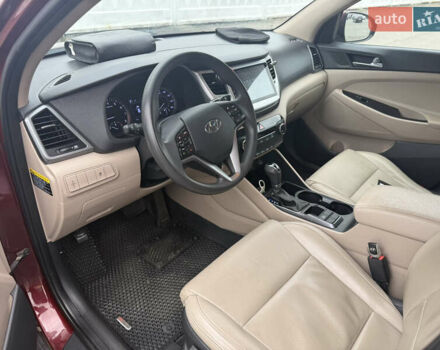 Червоний Хендай Туксон, об'ємом двигуна 2 л та пробігом 93 тис. км за 16500 $, фото 6 на Automoto.ua