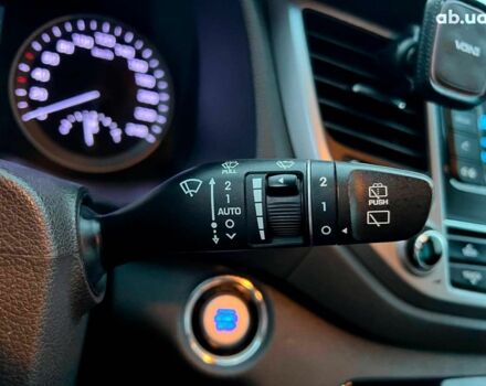 Червоний Хендай Туксон, об'ємом двигуна 2 л та пробігом 136 тис. км за 18690 $, фото 25 на Automoto.ua