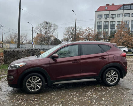 Червоний Хендай Туксон, об'ємом двигуна 2 л та пробігом 150 тис. км за 13300 $, фото 1 на Automoto.ua