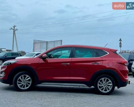 Червоний Хендай Туксон, об'ємом двигуна 2 л та пробігом 136 тис. км за 18690 $, фото 5 на Automoto.ua