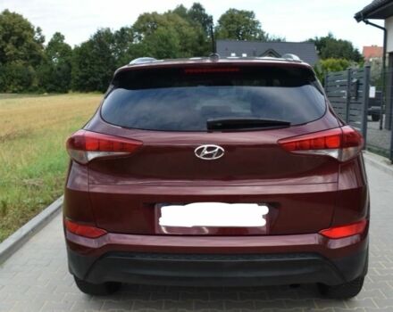 Червоний Хендай Туксон, об'ємом двигуна 2 л та пробігом 117 тис. км за 10300 $, фото 4 на Automoto.ua