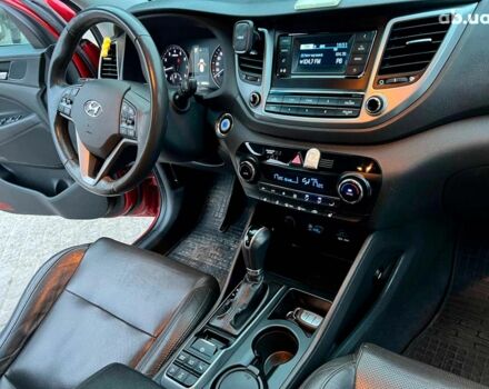 Червоний Хендай Туксон, об'ємом двигуна 2 л та пробігом 136 тис. км за 18690 $, фото 40 на Automoto.ua