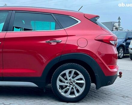 Червоний Хендай Туксон, об'ємом двигуна 2 л та пробігом 136 тис. км за 18690 $, фото 3 на Automoto.ua