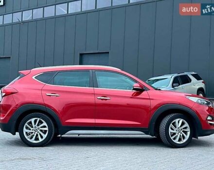 Червоний Хендай Туксон, об'ємом двигуна 2 л та пробігом 136 тис. км за 18690 $, фото 10 на Automoto.ua