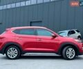 Червоний Хендай Туксон, об'ємом двигуна 2 л та пробігом 136 тис. км за 18690 $, фото 10 на Automoto.ua
