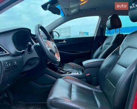 Червоний Хендай Туксон, об'ємом двигуна 2 л та пробігом 136 тис. км за 18690 $, фото 19 на Automoto.ua