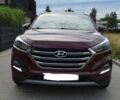 Червоний Хендай Туксон, об'ємом двигуна 2 л та пробігом 117 тис. км за 10300 $, фото 1 на Automoto.ua