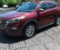 Красный Хендай Туксон, объемом двигателя 2 л и пробегом 72 тыс. км за 5500 $, фото 2 на Automoto.ua