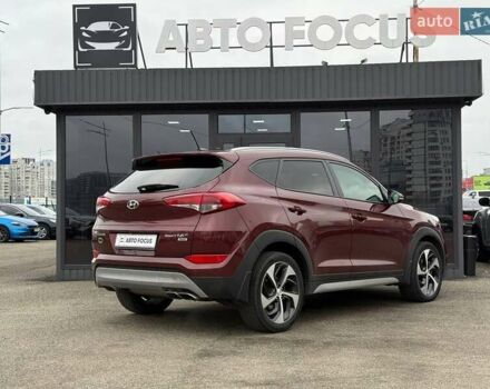 Червоний Хендай Туксон, об'ємом двигуна 1.59 л та пробігом 117 тис. км за 15890 $, фото 6 на Automoto.ua