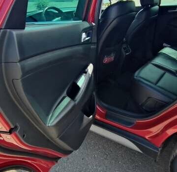 Червоний Хендай Туксон, об'ємом двигуна 2 л та пробігом 72 тис. км за 21500 $, фото 6 на Automoto.ua