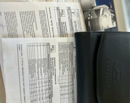 Червоний Хендай Туксон, об'ємом двигуна 2 л та пробігом 150 тис. км за 13300 $, фото 11 на Automoto.ua