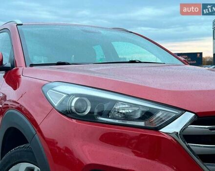 Червоний Хендай Туксон, об'ємом двигуна 2 л та пробігом 136 тис. км за 18690 $, фото 13 на Automoto.ua