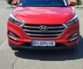 Красный Хендай Туксон, объемом двигателя 2 л и пробегом 99 тыс. км за 20900 $, фото 1 на Automoto.ua