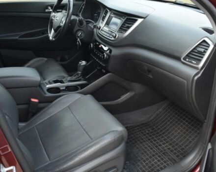 Червоний Хендай Туксон, об'ємом двигуна 2 л та пробігом 117 тис. км за 10300 $, фото 6 на Automoto.ua