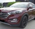 Красный Хендай Туксон, объемом двигателя 2 л и пробегом 34 тыс. км за 10000 $, фото 1 на Automoto.ua