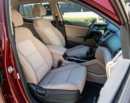 Червоний Хендай Туксон, об'ємом двигуна 1.6 л та пробігом 54 тис. км за 10300 $, фото 10 на Automoto.ua