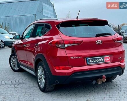Червоний Хендай Туксон, об'ємом двигуна 2 л та пробігом 136 тис. км за 18690 $, фото 6 на Automoto.ua