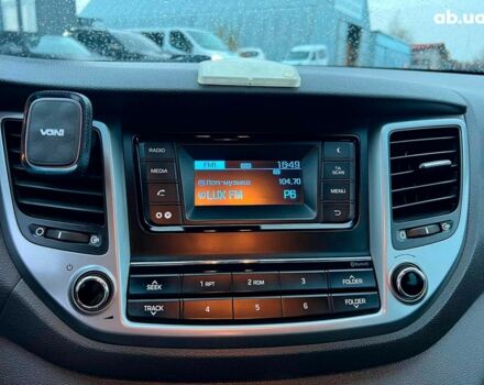 Червоний Хендай Туксон, об'ємом двигуна 2 л та пробігом 136 тис. км за 18690 $, фото 28 на Automoto.ua