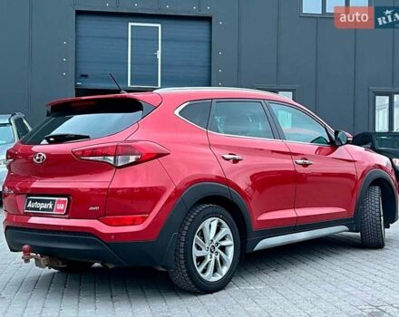 Червоний Хендай Туксон, об'ємом двигуна 2 л та пробігом 136 тис. км за 18690 $, фото 8 на Automoto.ua